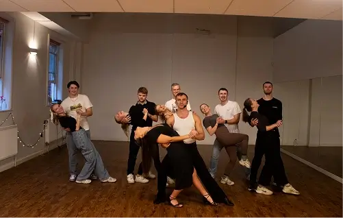 Manchester student improving salsa technique in a private lesson